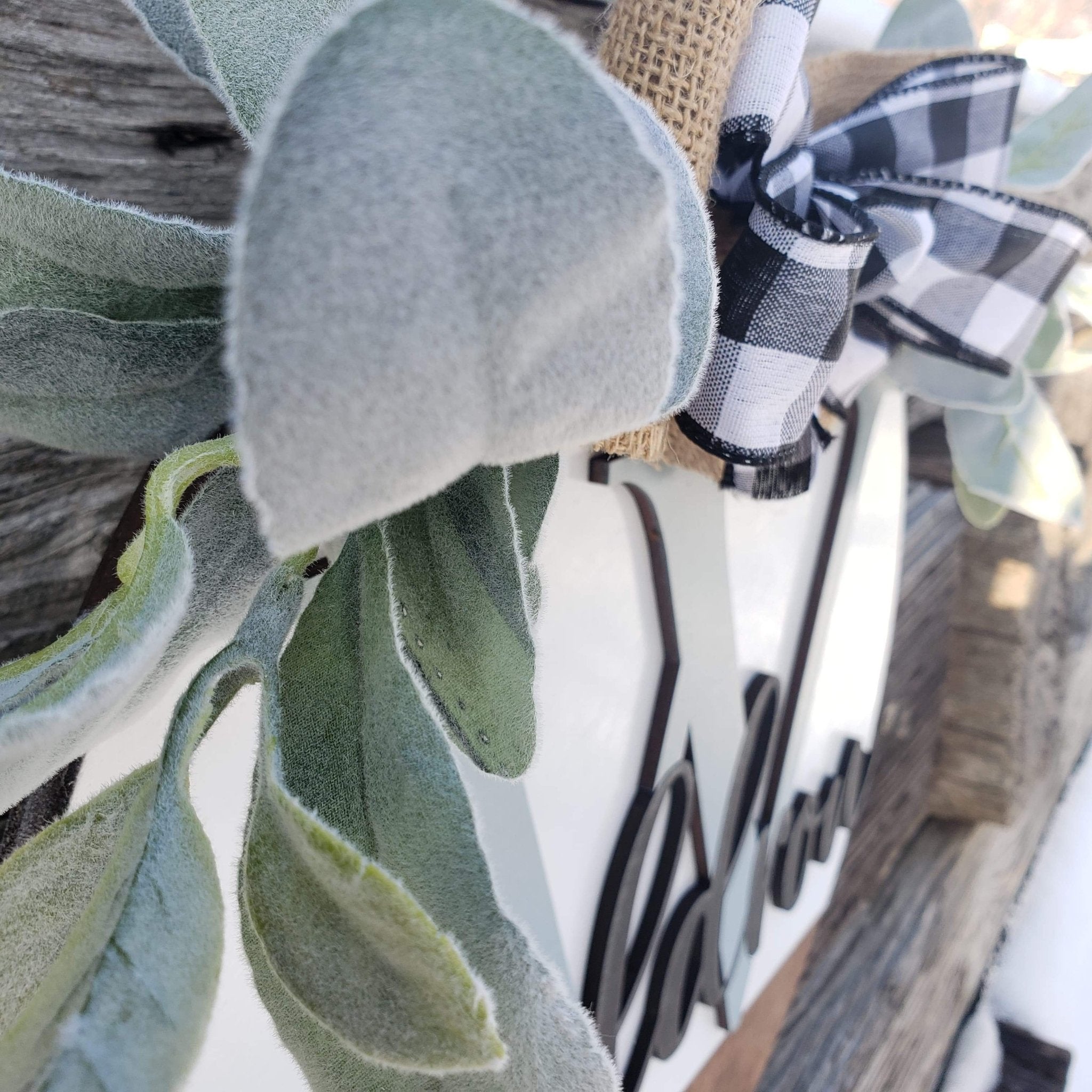 18 inch wooden farmhouse door hanger with greenery and buffalo plaid bow